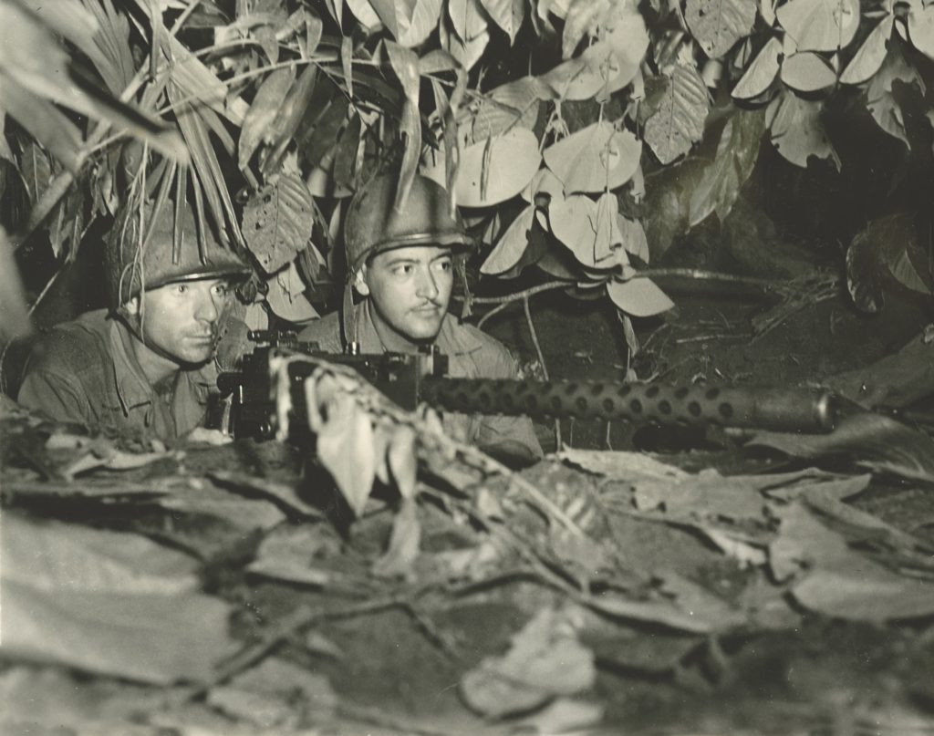 Soldiers man a .30-caliber Browning machine gun in an unknown location—possibly Saipan—in July 1944. Salomon commandeered a similar machine gun during the banzai charge, taking on desperate Japanese armed with bayonet-tipped Arisaka rifles as well as improvised weapons. (U.S. Army Signal Corps/Gift of Donald E. Mittelstaedt)