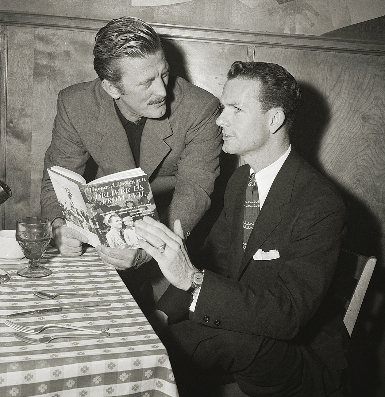 Dooley and Kirk Douglas in 1956. / Getty Images