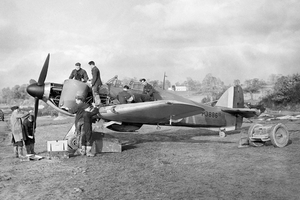 Flag Officer Carl Davis flew this Hawker Hurricane Mk. I with No. 601 (County of London) Squadron, shown here being serviced, some time in late September 1940. (IWM CH 1638)