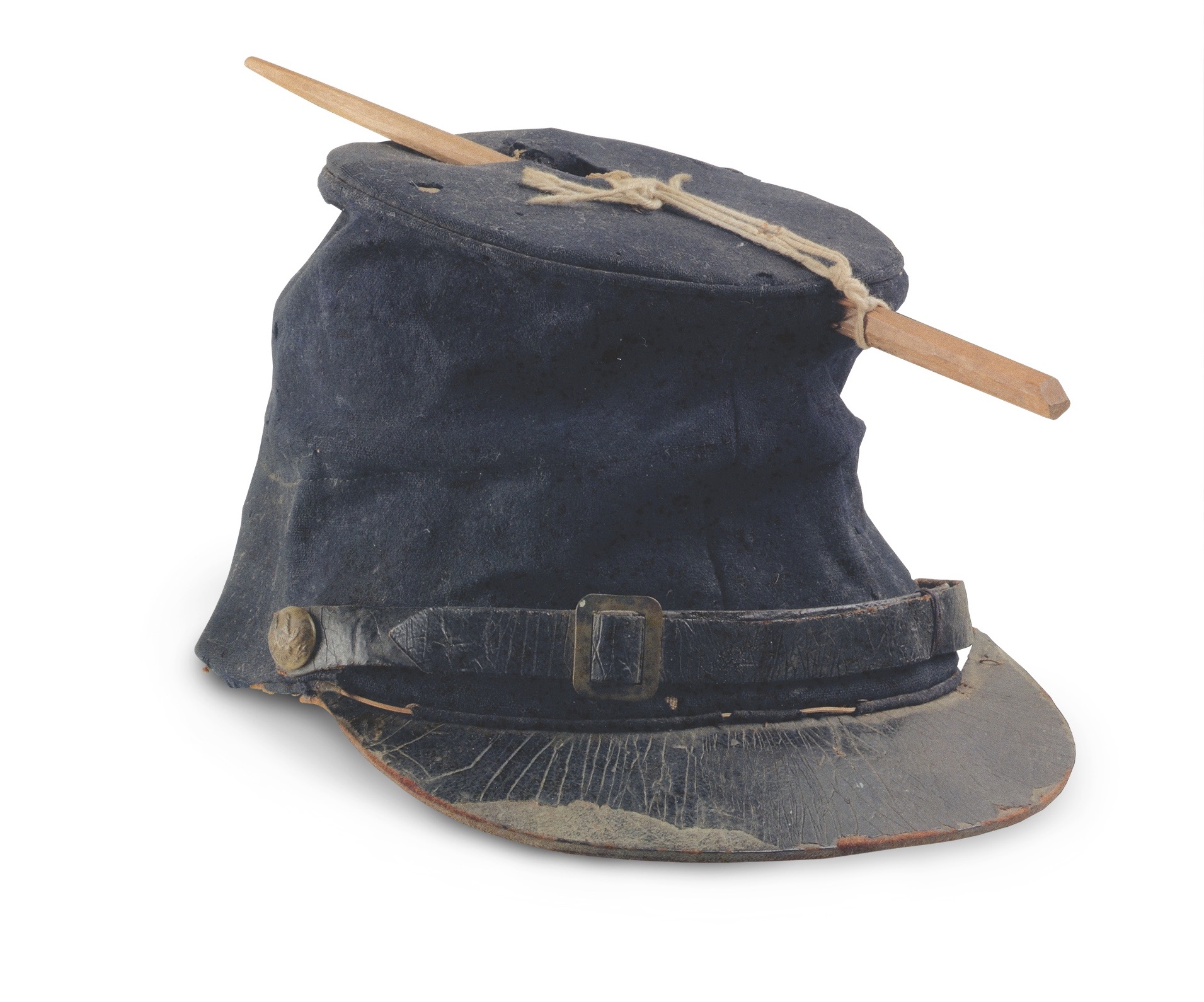 First Lieutenant Andrew Eagleson was leading his men at Antietam when a bullet tore through his forage cap. Eagleson kept the artifact of his brush with death, marking the bullet’s path with a stick. (Ken Turner Collection)