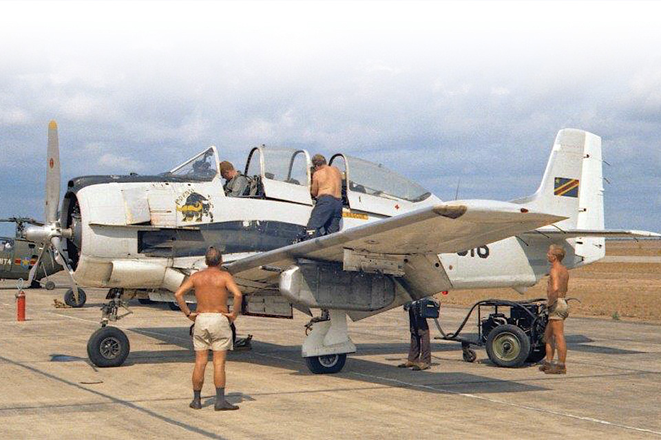 Ground crew prepare a Makasi T-28 Trojan for a mission. (T-28 Trojan Foundation)