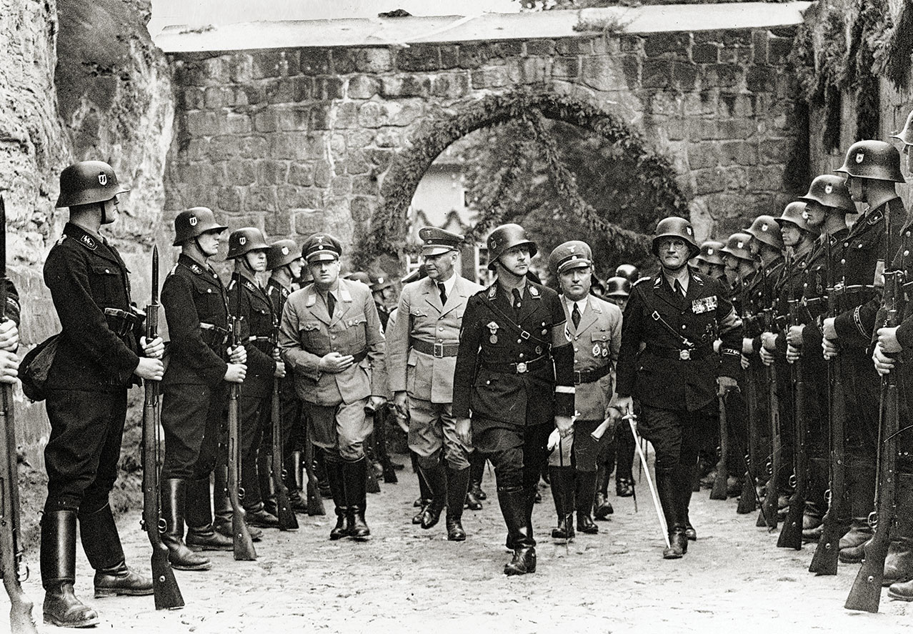 Himmler (center), with Nazi notables Hans Frank, who would become the tyrannical Nazi governor of occupied Poland, and Robert Ley, slave labor organizer, at the Quedlinburg 1936 "King Heinrich" festival.