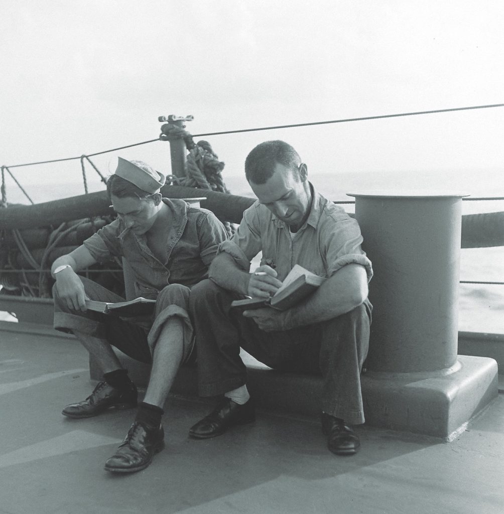 Warship routine included plenty of downtime. Rowe, like these sailors, often read to pass the hours. (Ralph Morse/The LIFE Picture Collection via Getty Images)
