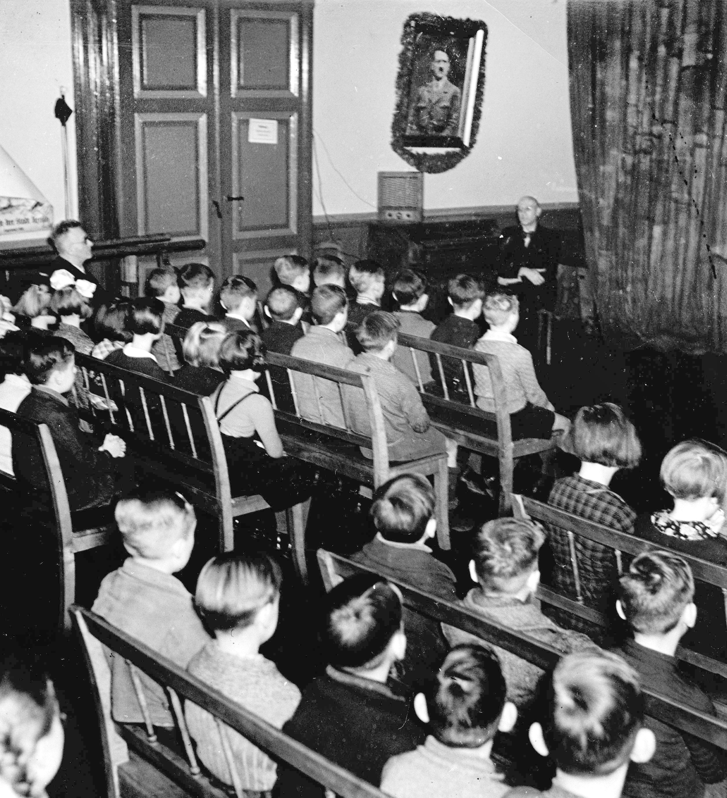 'A' is for 'anger' - Propaganda in the phonetic alphabet would have had the strongest influence on German schoolchilden, such as these listening to a radio broadcast by Hermann Goering in 1940. / Polish State Archives