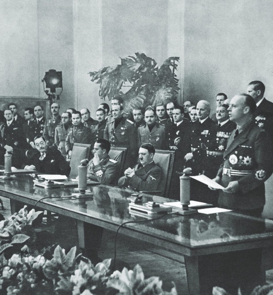 At the 1940 signing of the Tripartite Pact, Germany’s foreign minister, Joachim von Ribbentrop (far right), extended an invitation for other nations to join the Axis alliance established with Italy and Japan. Horthy was eager to accept. (The Stapleton Collection/Bridgeman)