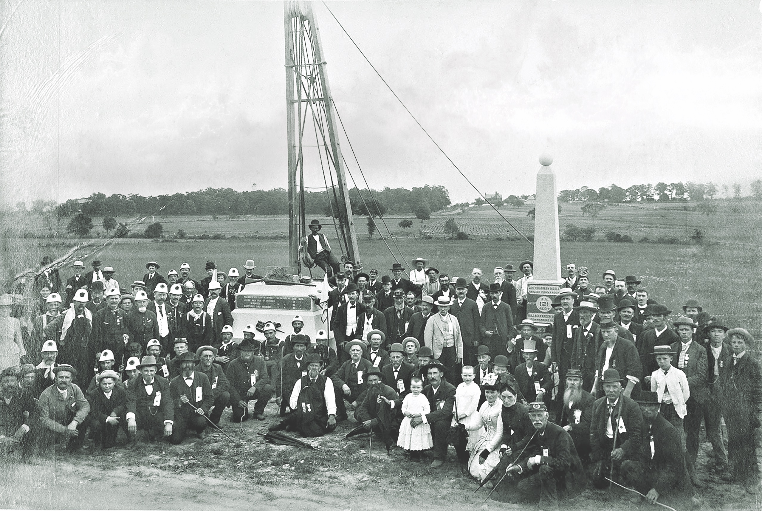 Veterans of the 121st Pennsylvania pose on Cemetery Ridge with their families during the dedication of the regiment’s memorial in 1888. The monument was erected on Seminary Ridge in 1886 before being moved. (NPS Photo)