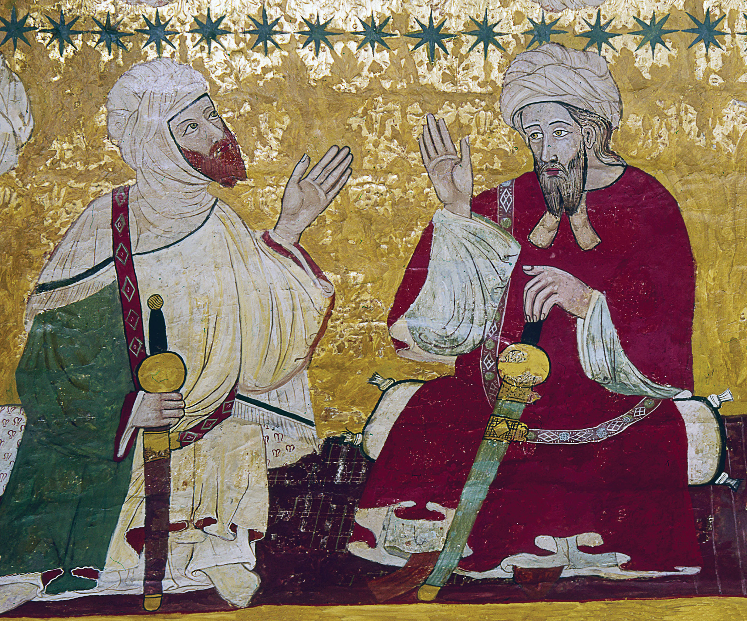A circa 1375 painting on the leather ceiling of the Sala de Los Reyes, at the Alhambra palace in Granada, Spain, depicts Moors in conversation / Granger