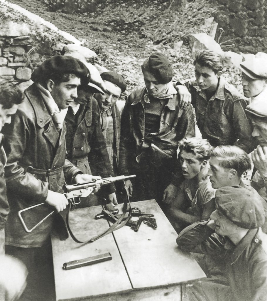 Resistance fighters receive training on a British Sten gun, circa 1943. (Pictorial Press Ltd/Alamy)