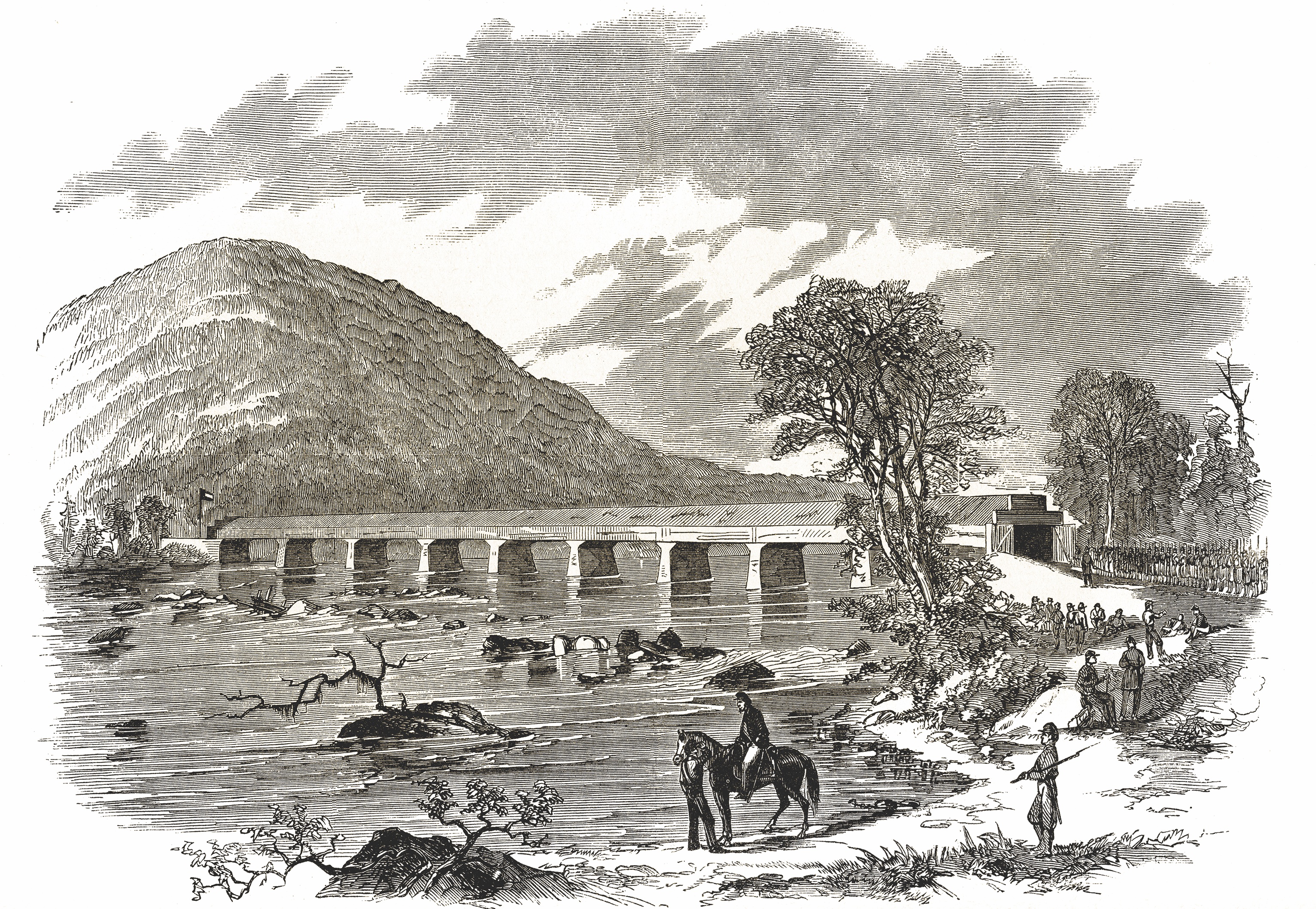 Union soldiers on the Maryland shore at Point of Rocks eye up a Confederate flag flying in Loudoun County, Va. The bridge was burned on June 14, 1861. (Harper's Ferry Weekly)