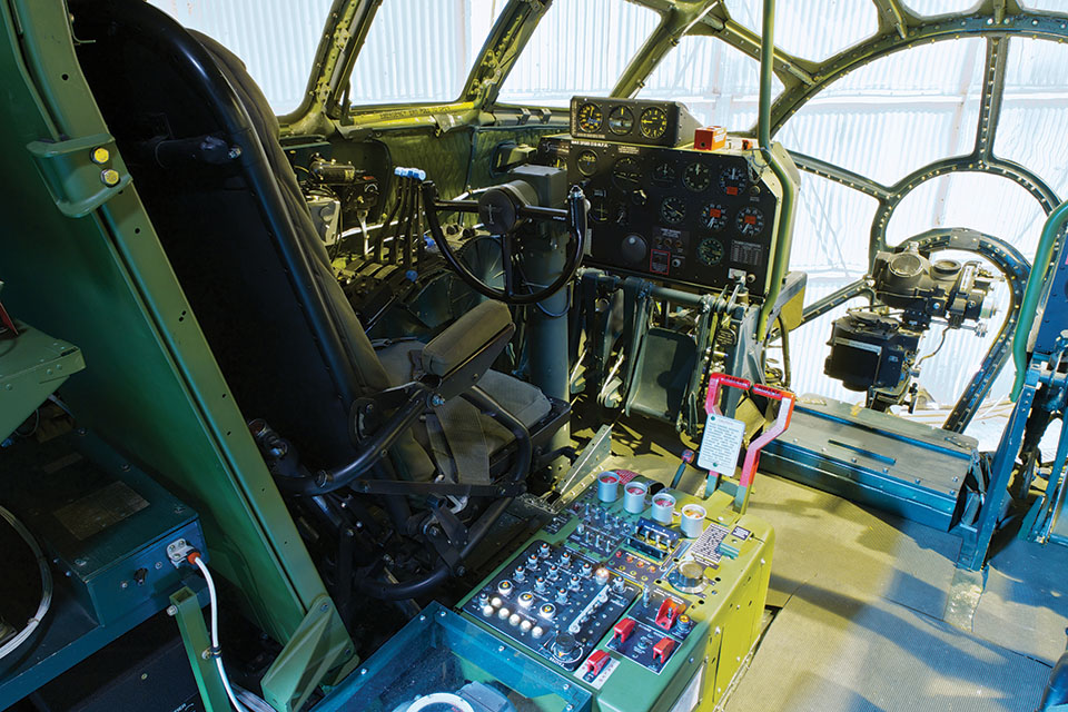 A view of the command pilot’s position and working Norden bombsight. (The Museum of Flight)