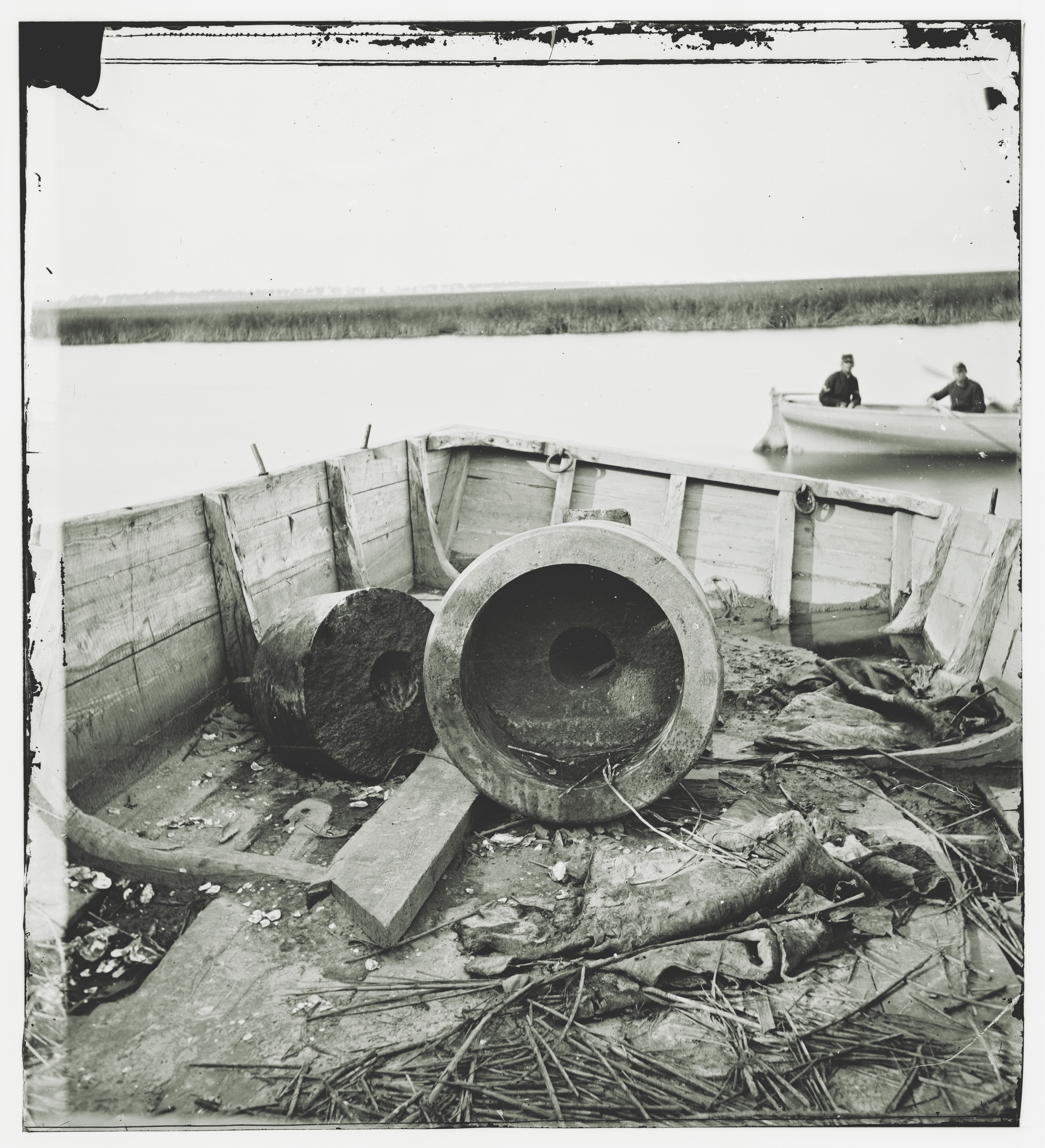 This photo of remains from the Floating Battery was taken in Charleston Harbor after the vessel was devastated during a storm in 1863. Fort Sumter was in Union hands by then. (Library of Congress)