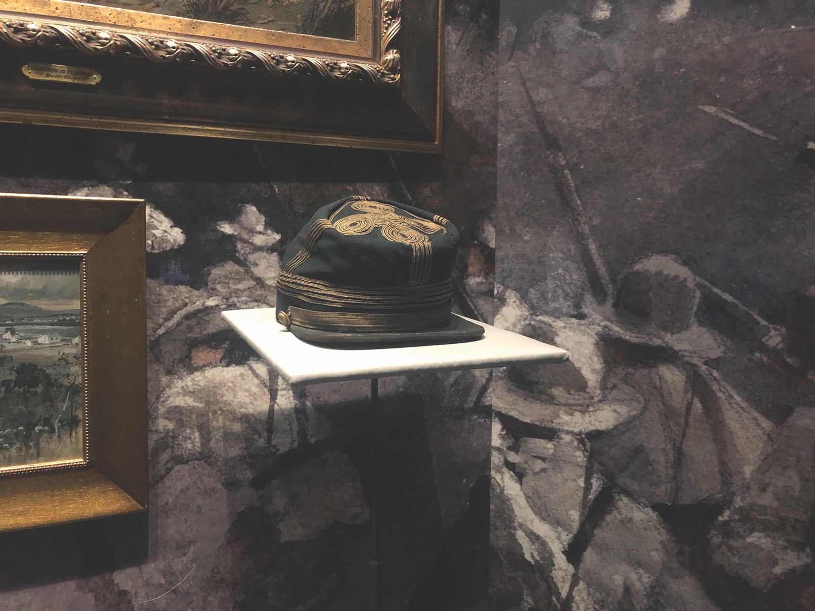 The general’s embroidered kepi, left, is on display at Nashville’s Tennessee State Museum. (John Banks)
