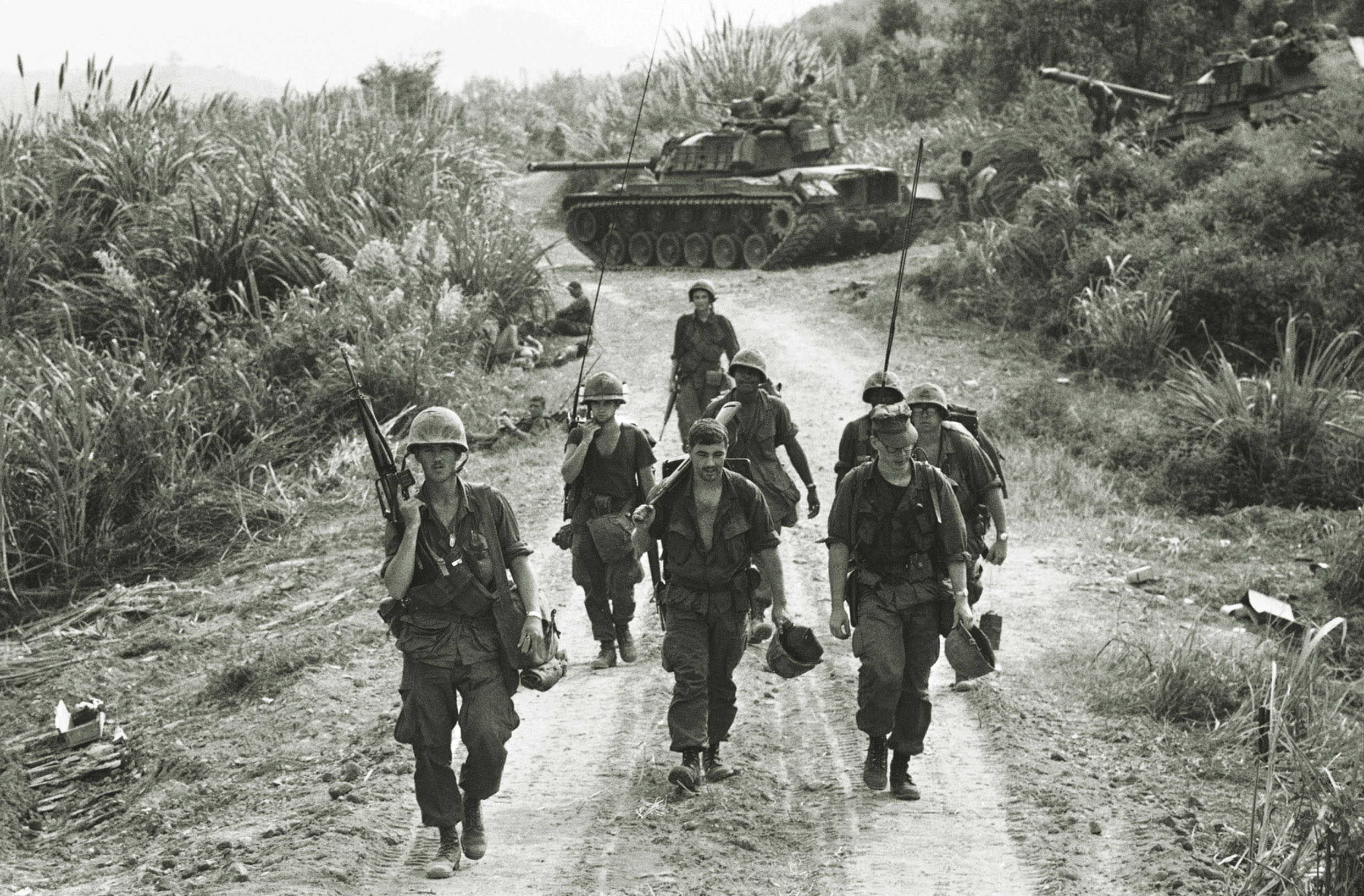 A Marine unit moves toward Khe Sanh on April 7, 1968, while a tank provides road security, during Operation Pegasus, which forced the North Vietnamese to end their siege. / AP