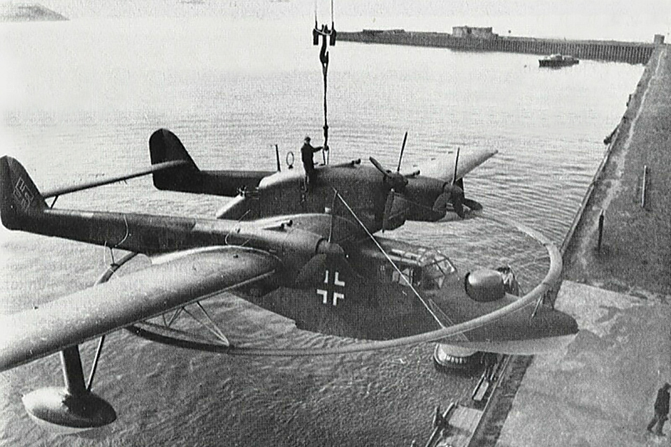 A Blohm und Voss Bv-138MS is hoisted aboard a seaplane tender. The modified Bv-138s and similarly equipped Ju-52/3ms were the two main German aerial minesweepers. (Historynet Archives)