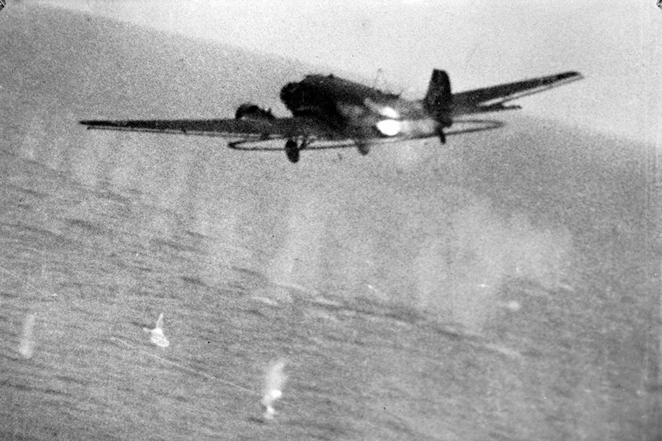 A German Junkers Ju-52/3m MS minesweeper erupts in flames after being targeted by an RAF Hawker Typhoon off Lorient, France. (IWM C4095)