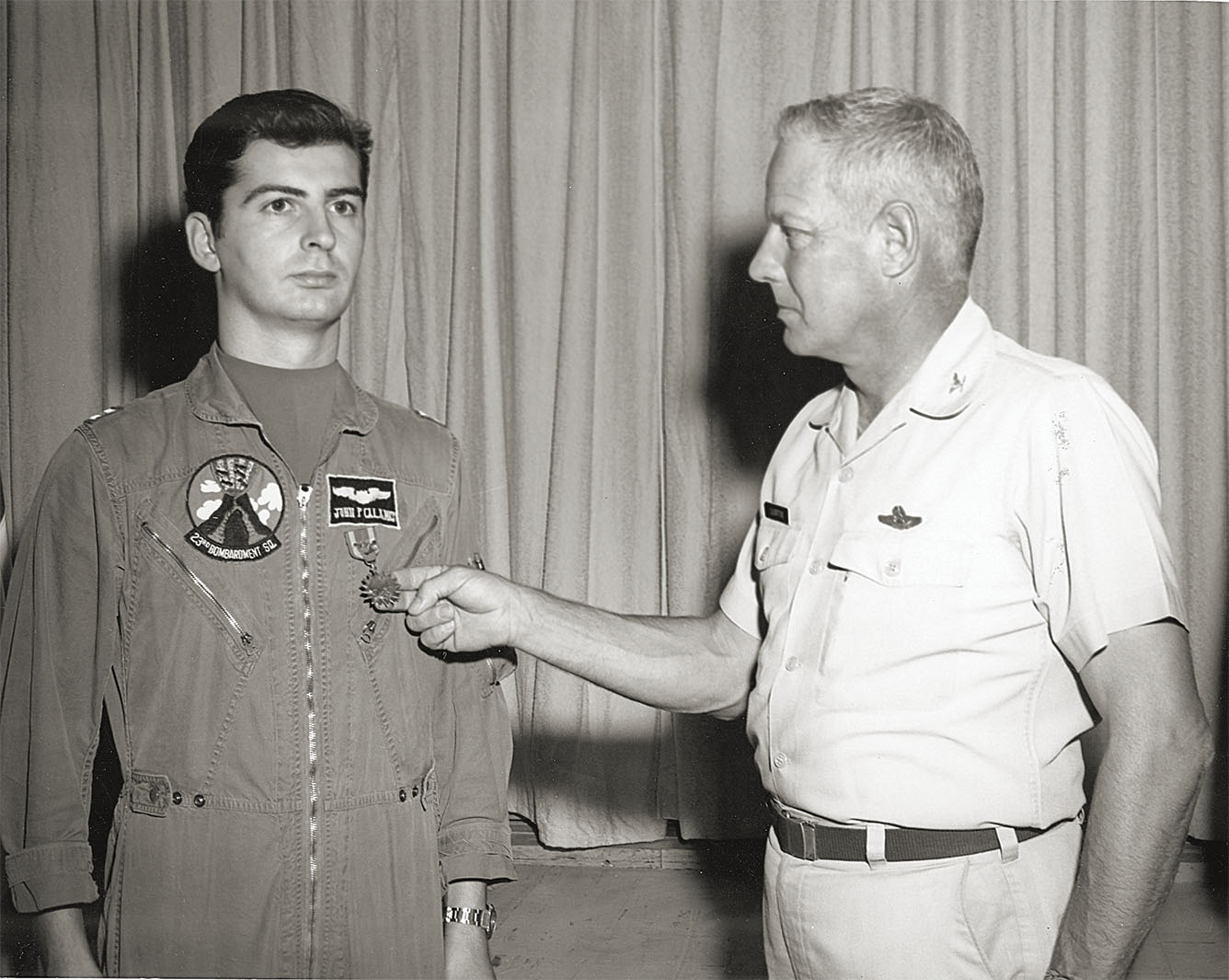 Calamos, who flew B-52s with the 23rd Bombardment Squadron in the U.S., receives an Air Medal. / U.S. Air Force