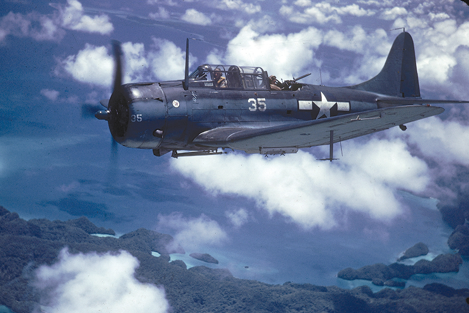 Pilot George Glacken and gunner Leo Boulanger fly in an SBD-5 near New Guinea in April 1944. (J.R. Eyerman/The LIFE Picture Collection via Getty Images)