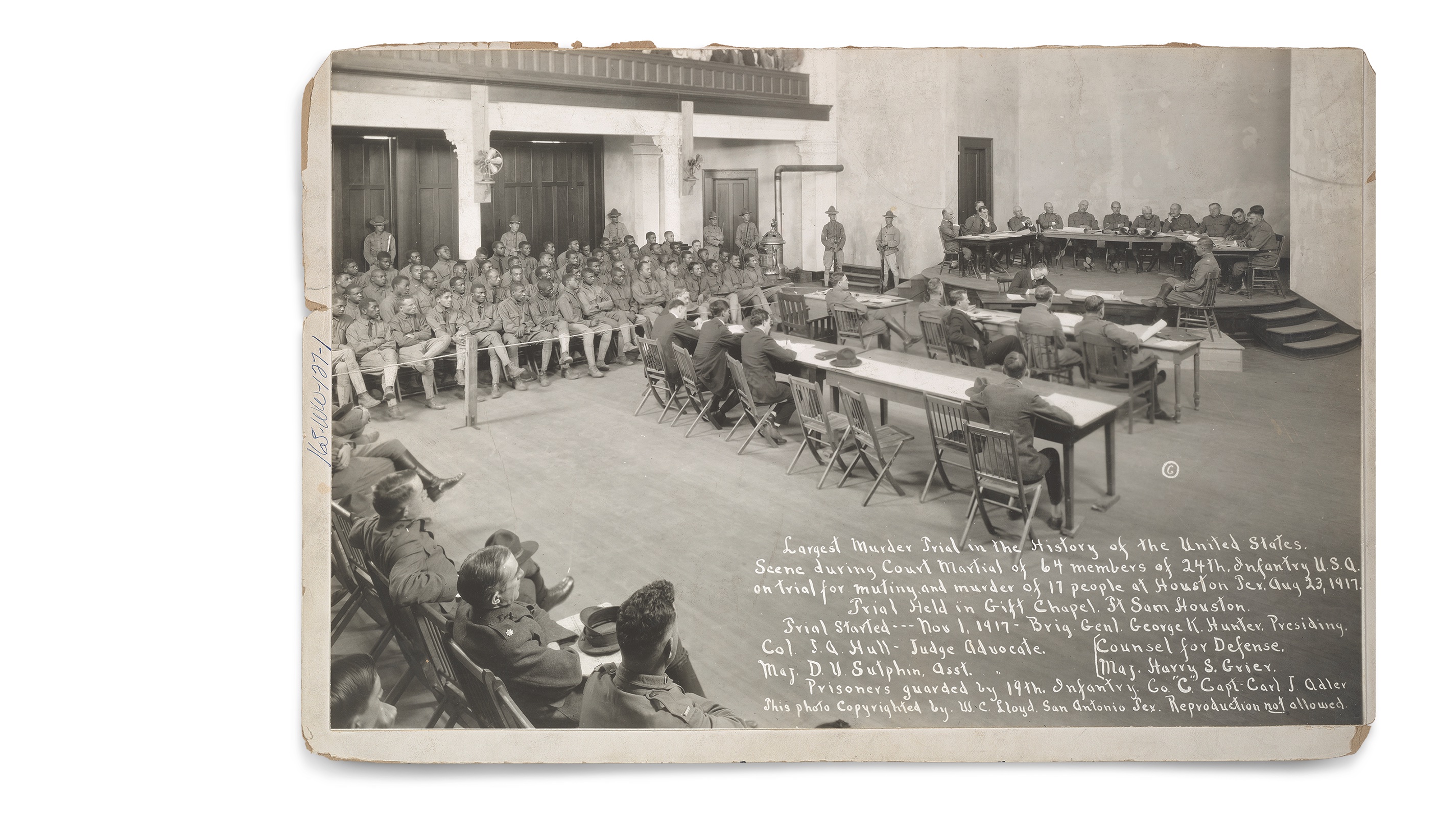 This photograph, taken on August 23, 1917, and captioned “Largest Murder Trial in the History of the United States,” shows nearly all of the 63 African American defendants in the first court-martial. (National Archives)