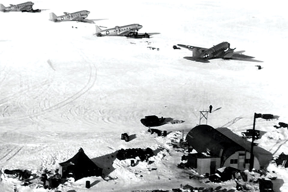 R4Ds line up on the ice at the Little America IV base. (National Museum of Naval Aviation)
