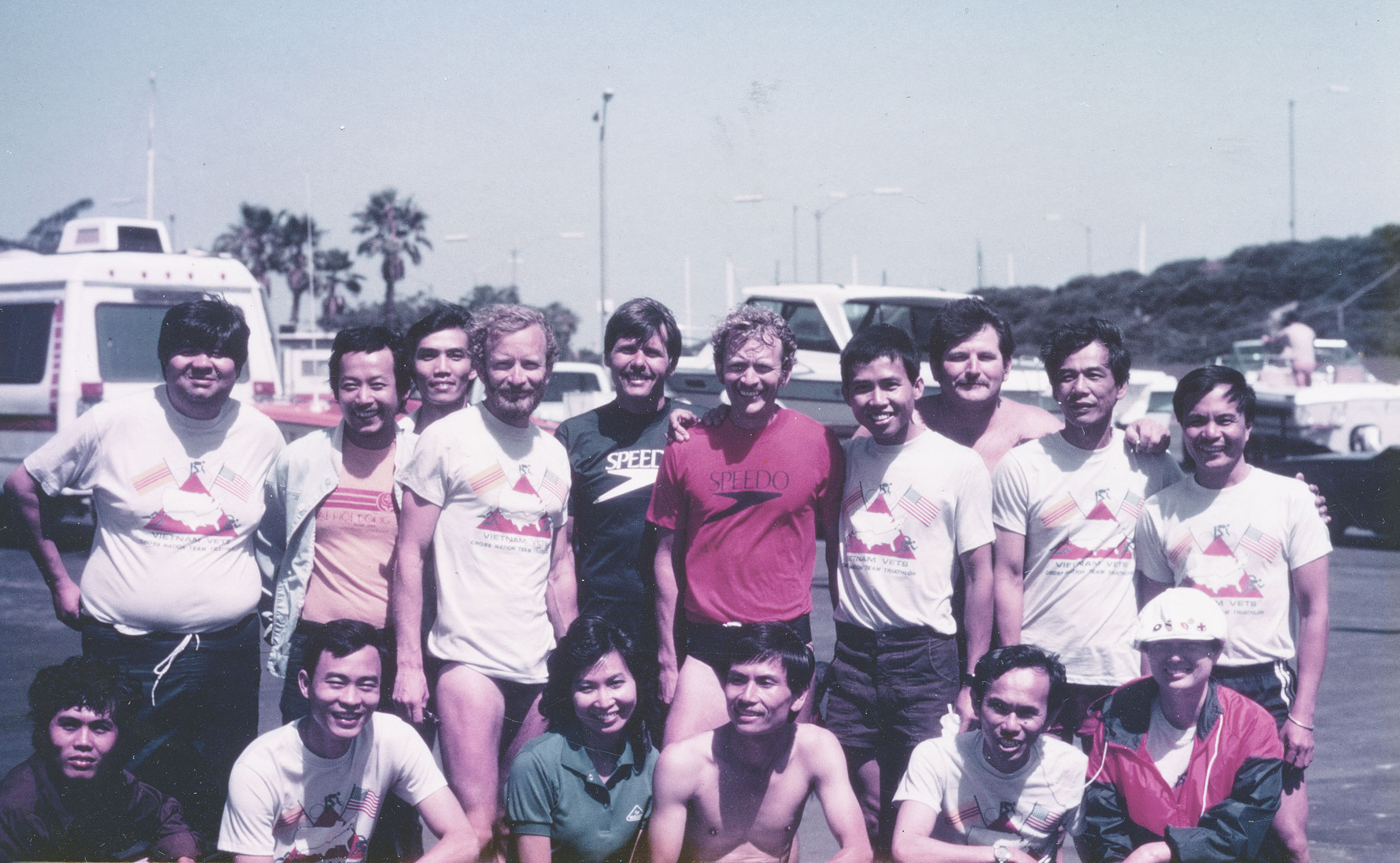 The four-veteran team poses with supporters on June 20, 1984, after three of them, Jim and Ron Barker and Langford, swam a 4-mile relay off Long Beach, California, to kick off the triathlon. / Courtesy Jim Barker