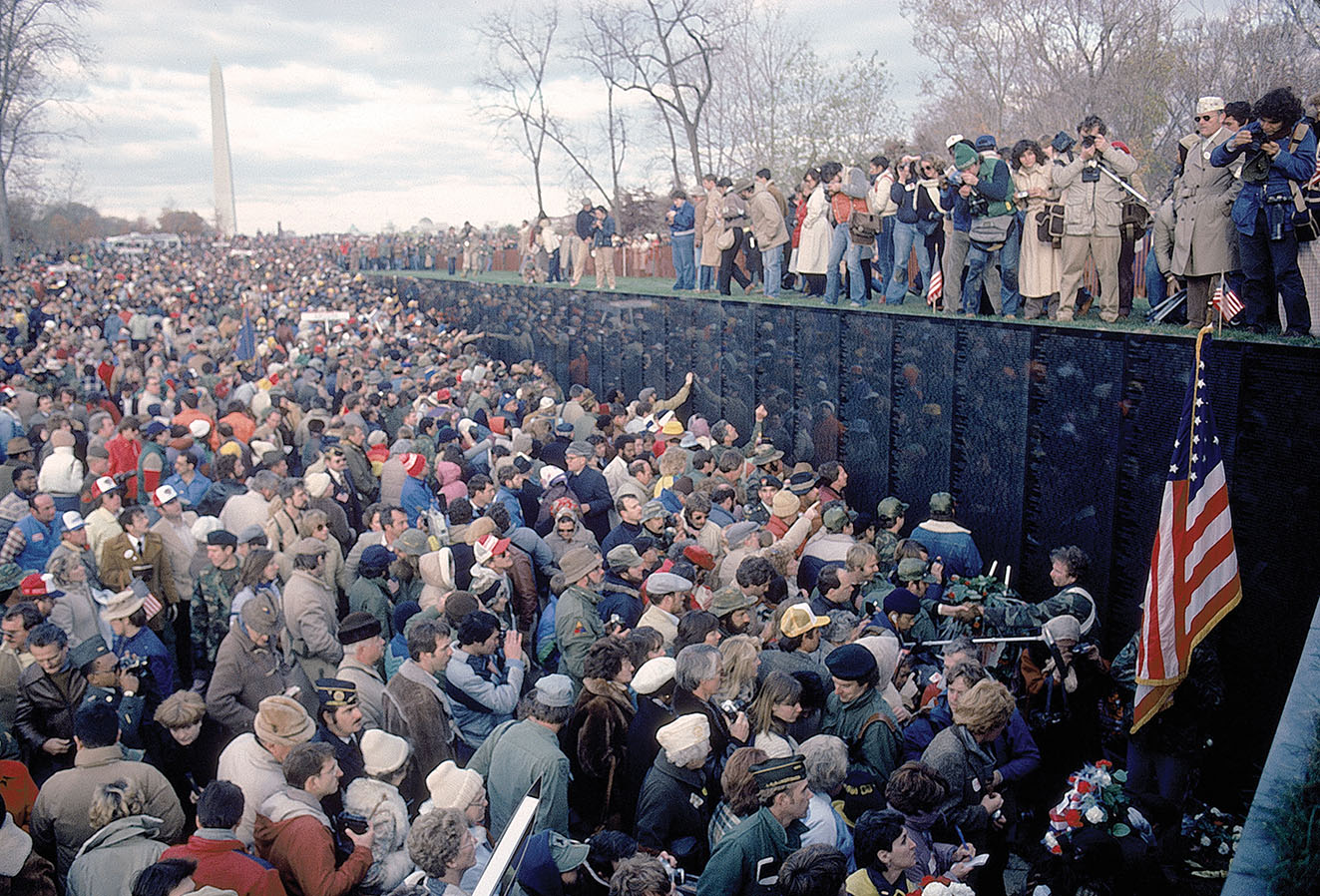 The dedication of the Vietnam Veterans Memorial on Nov. 13, 1982, drew thousands and had an emotional impact on many, including Jim Barker, who resolved to put triathletes on a course that reached the Wall on July 4, 1984. / Getty Images