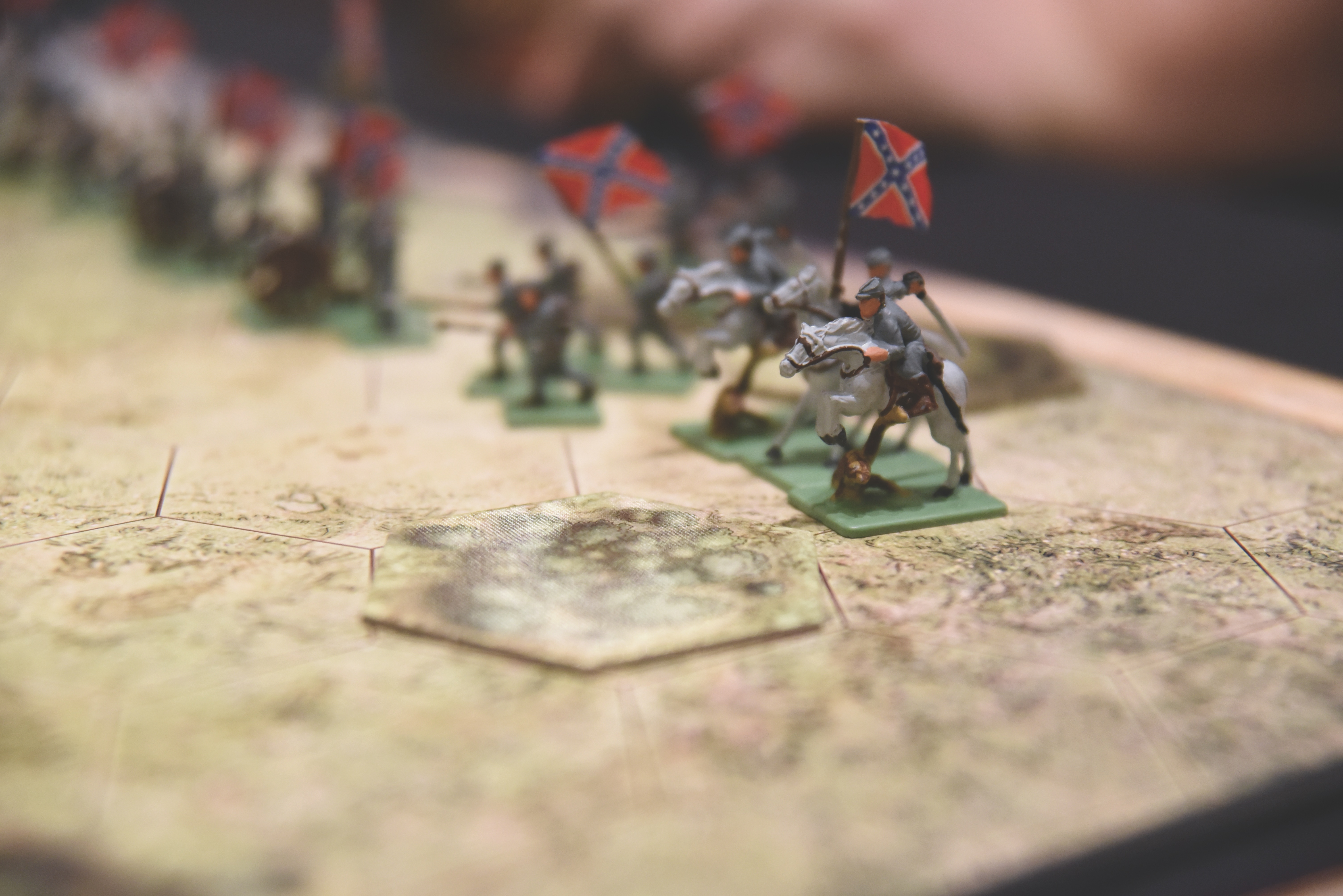 Southern troopers charge across the gameboard of Battle Cry!, powered by rolls of the dice and shrewd game-player skill. (Photo by Melissa A. Winn)