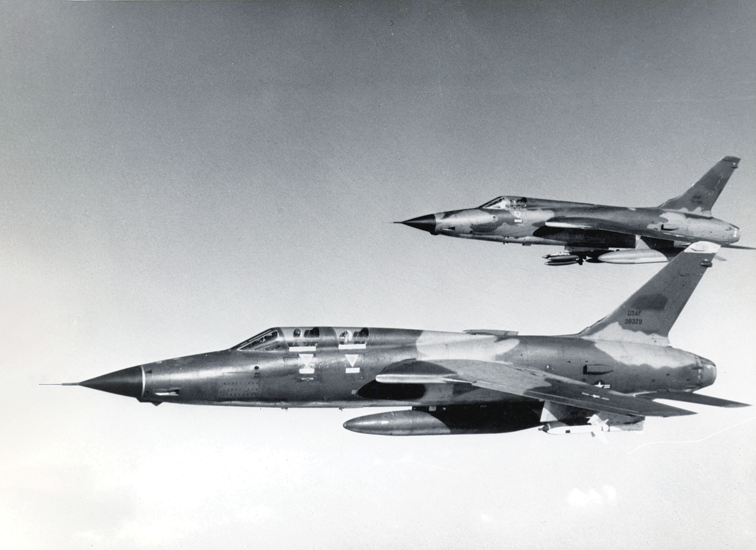 Two F-105 Thunderchiefs are on a “hunter-killer” flight to attack North Vietnam’s surface-to-air missile sites. / U.S. Air Force