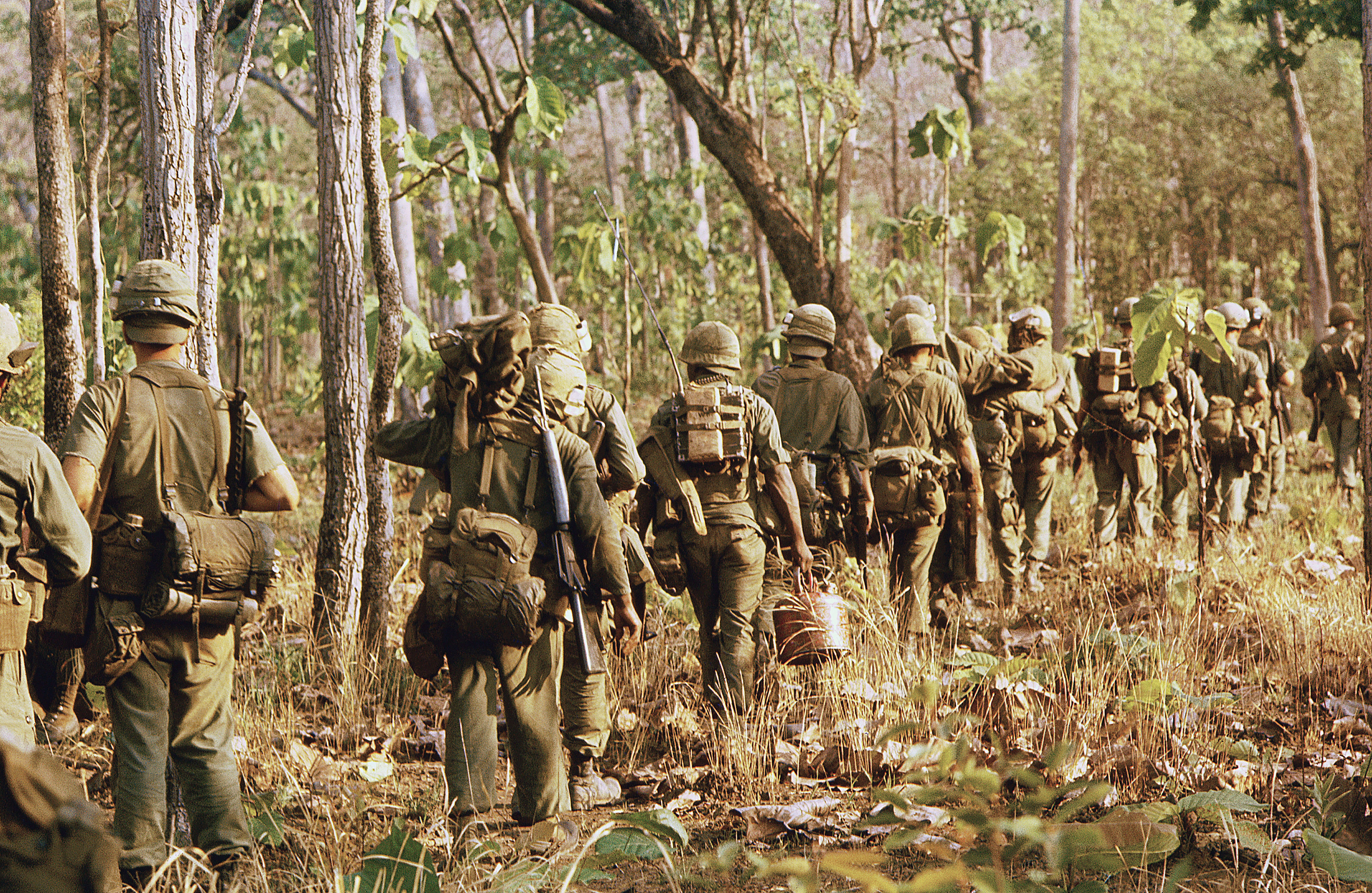 Troops of the 1st Cavalry Division (Airmobile) march through a forest on Chu Pong Mountain in the Ia Drang Valley in 1965. In November 1965, 1st Cav units in the valley fought the U.S. Army’s first large-scale battle against the North Vietnamese Army. A year later in the Ia Drang, the 1st Cav again found itself in a tough fight with the NVA. / Getty Images