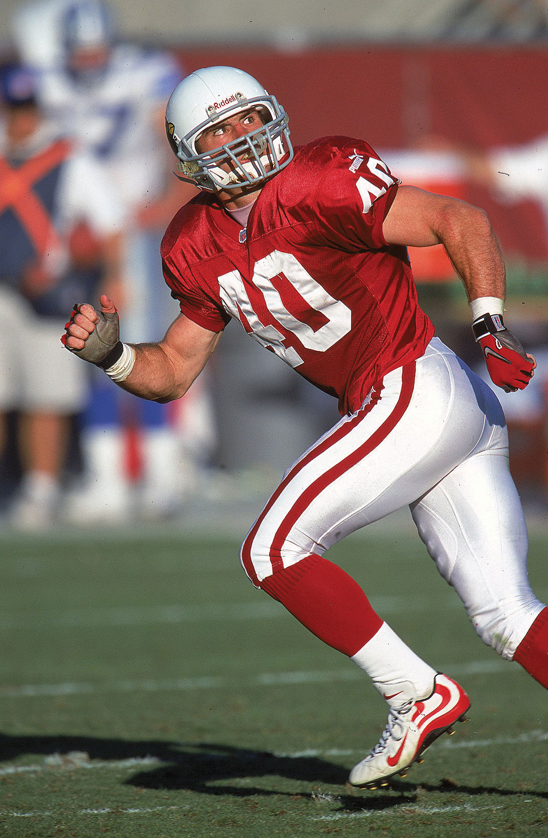 In 1998 Tillman joined the Arizona Cardinals, where he outworked  and outhit teammates to earn a  spot as the Cardinals’ strong safety. / Getty Images