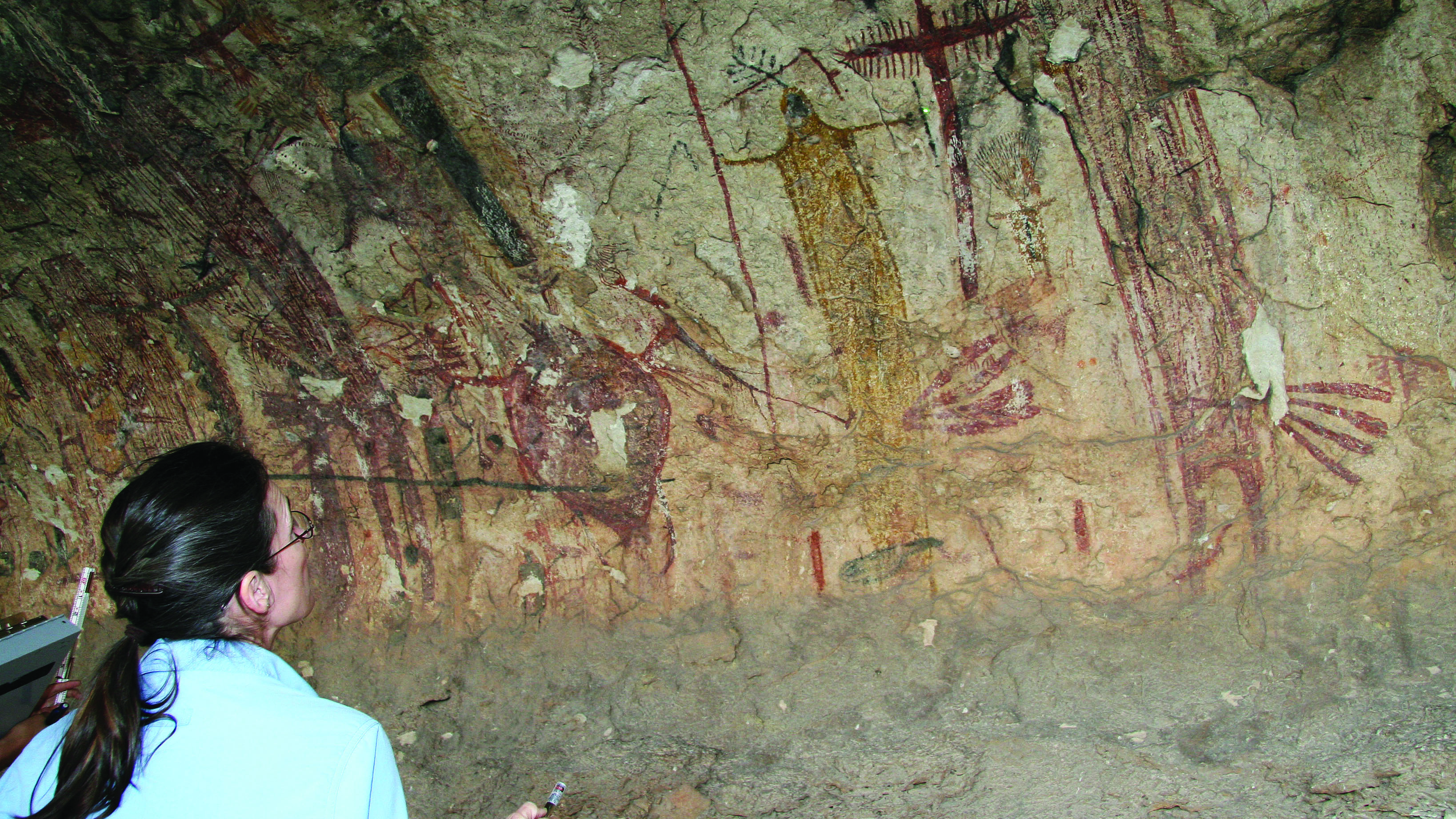 Archaeologist Carolyn Boyd studies a drawing in Panther Cave in Seminole Canyon State Park, Comstock, Texas. (AP Photo/Michael Graczyk)