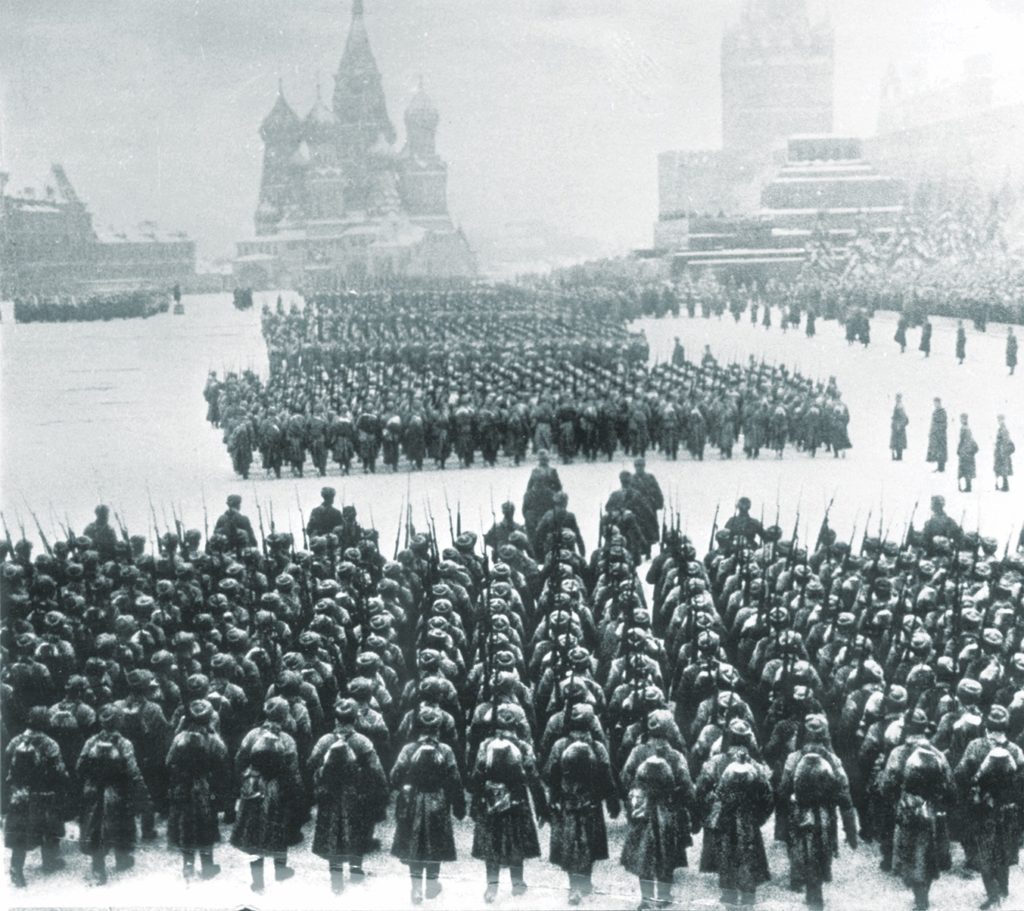 Soviet troops parade in Red Square on November 7, 1941; in a symbolic display of resolve, they then marched straight to the front. (Sovfoto/UIG via Getty Images)