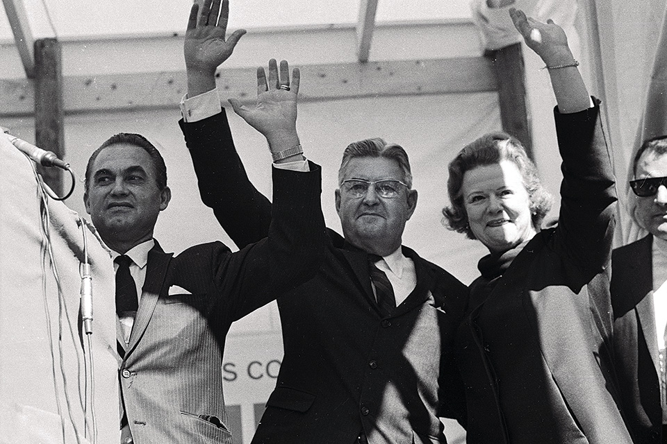 Third party presidential candidate George Wallace (left) and his running mate, LeMay, wave to a crowd during a 1968 rally in Newark, N.J. (Bettmann/Getty Images)