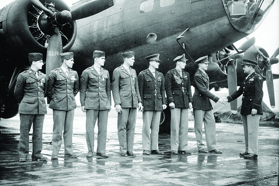 Colonel LeMay congratulates a B-17 crew of his 305th Bomb Group at RAF Chelveston in 1943. (Eraza Collection/Alamy)