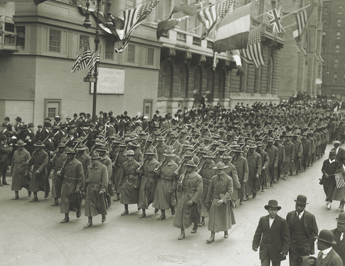 The all-Black 15th New York Infantry Regiment marches up Fifth Avenue in New York City in 1917. The following year it would be redesignated the 369th Infantry Regiment. (Bettmann/Getty Images)