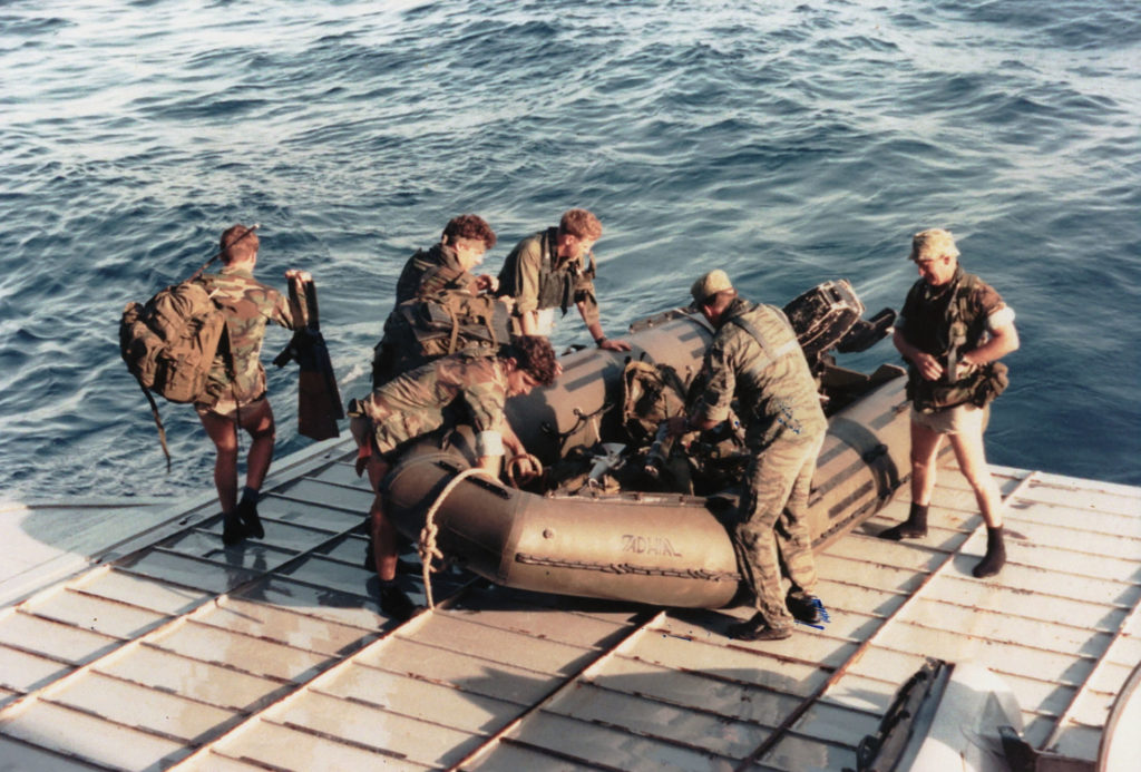 A SEAL team trains with an inflatable Zodiac boat. / U.S. Navy SEAL Museum
