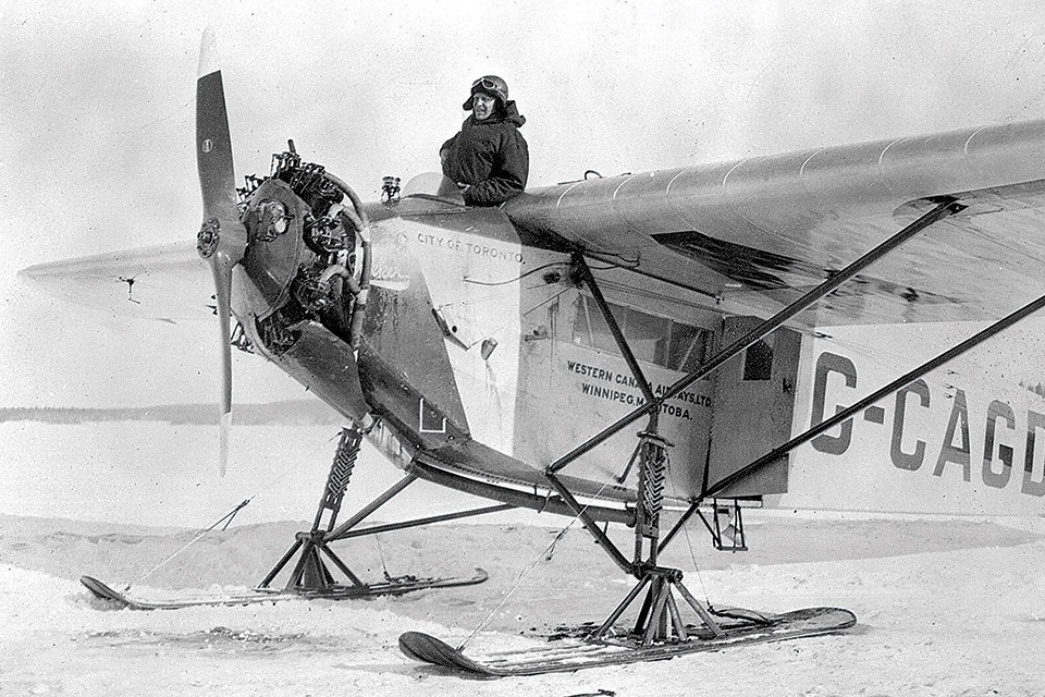 Norwegian polar explorer Bernt Balchen stands in a Fokker Universal, an early bush plane that Noorduyn helped design. (Stock Imagery/Alamy)