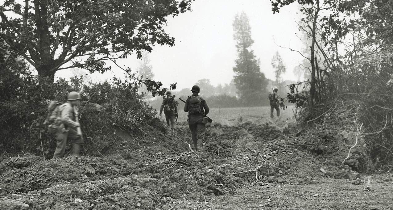 “Fighting through this bocage country was famously bloody,” Neill wrote, “as combatants engaged each other at distances sometimes of just a few yards." / National Archives 