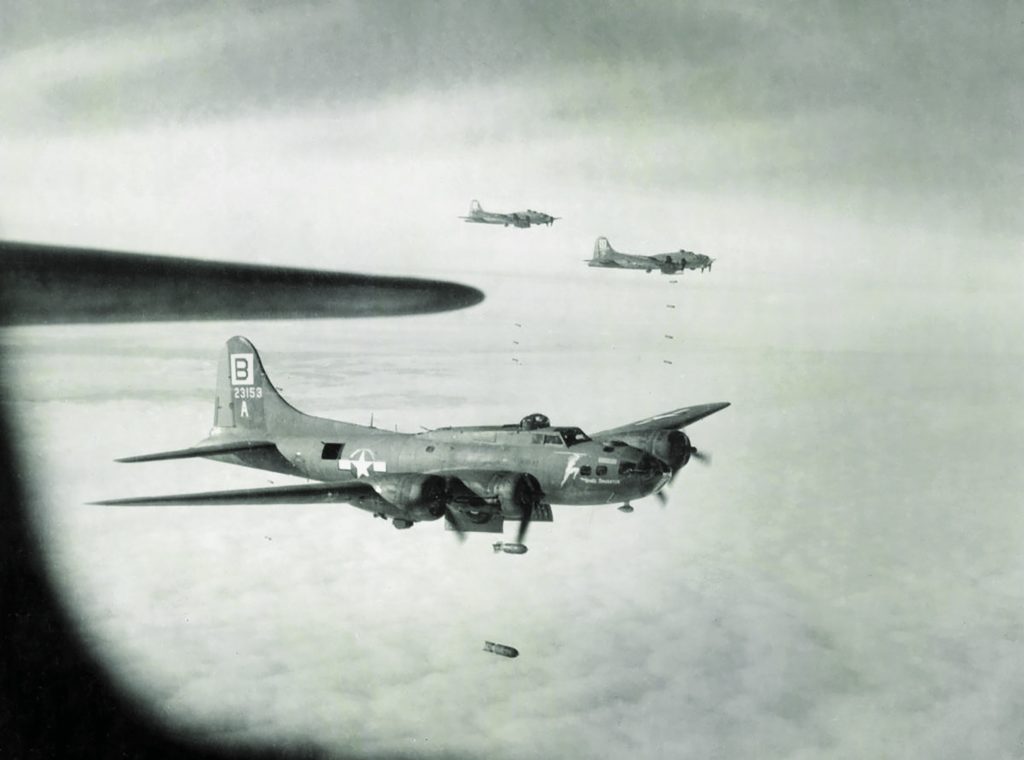B-17s of the 95th Bomb Group—here near Wilhelmshaven, Germany—were easily identified by the large “B” on the tail. (IWM EA 10750)