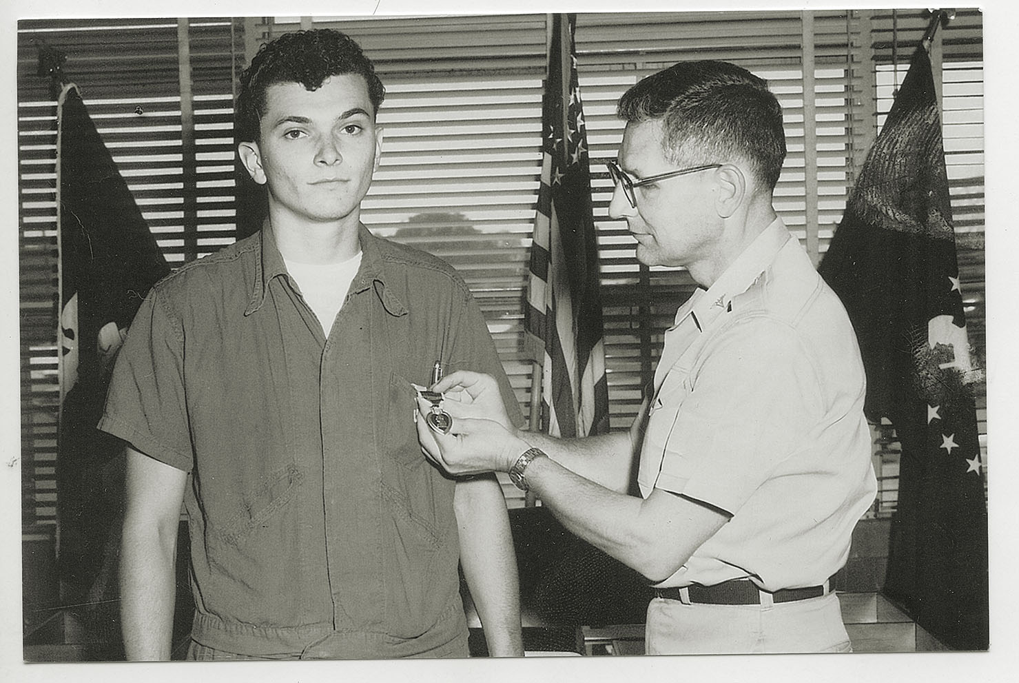 Renza receives a Purple Heart in July 1967 at Camp Zama, Japan. He was wounded in an ambush that left 21 of his comrades dead. / Courtesy Victor Renza