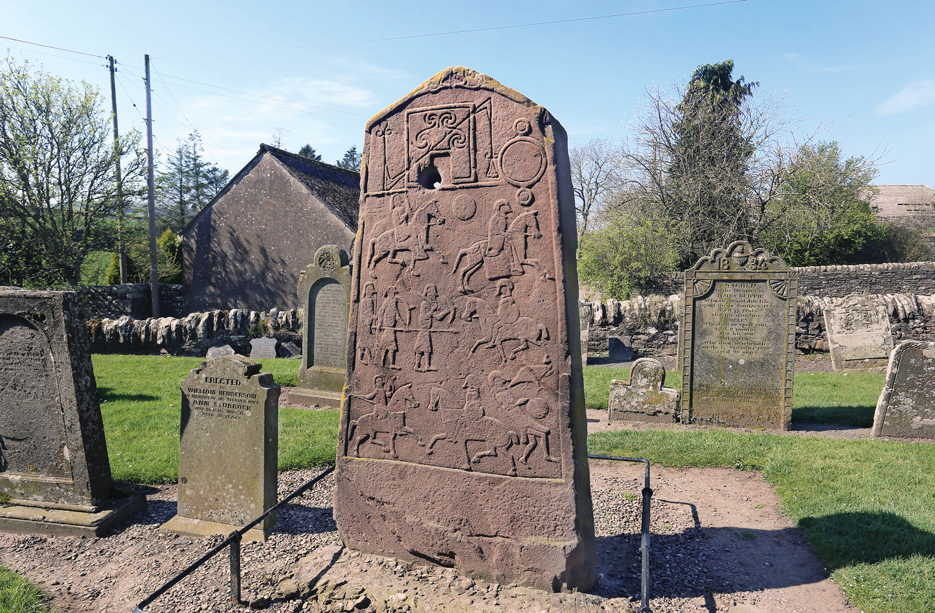 Aberlemno 2—one of five sculptured stones found in and around the eponymous village—stands in a churchyard. / Alamy