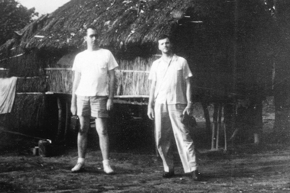 Kelly (right) and a squadron mate reflect the casual setting that was the Philippines in late 1941. (Florida State Archives)