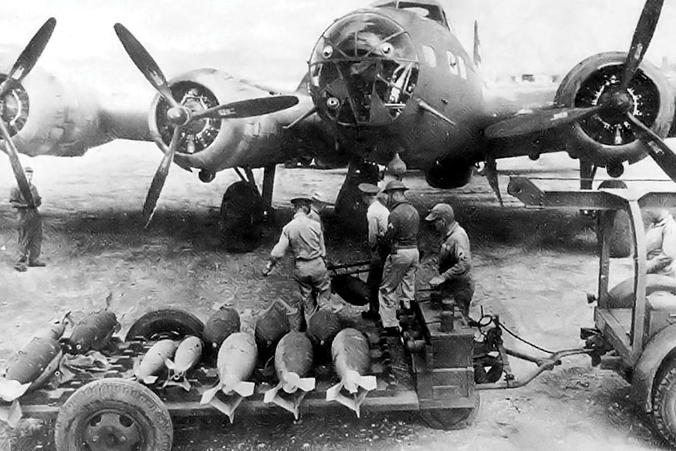 Ground crewmen load a surviving 19th Bomb Group B-17D with 100- and 500-pound bombs, probably at Del Monte Field on Mindanao, Philippines, early in 1942. (National Museum of the U.S. Air Force)