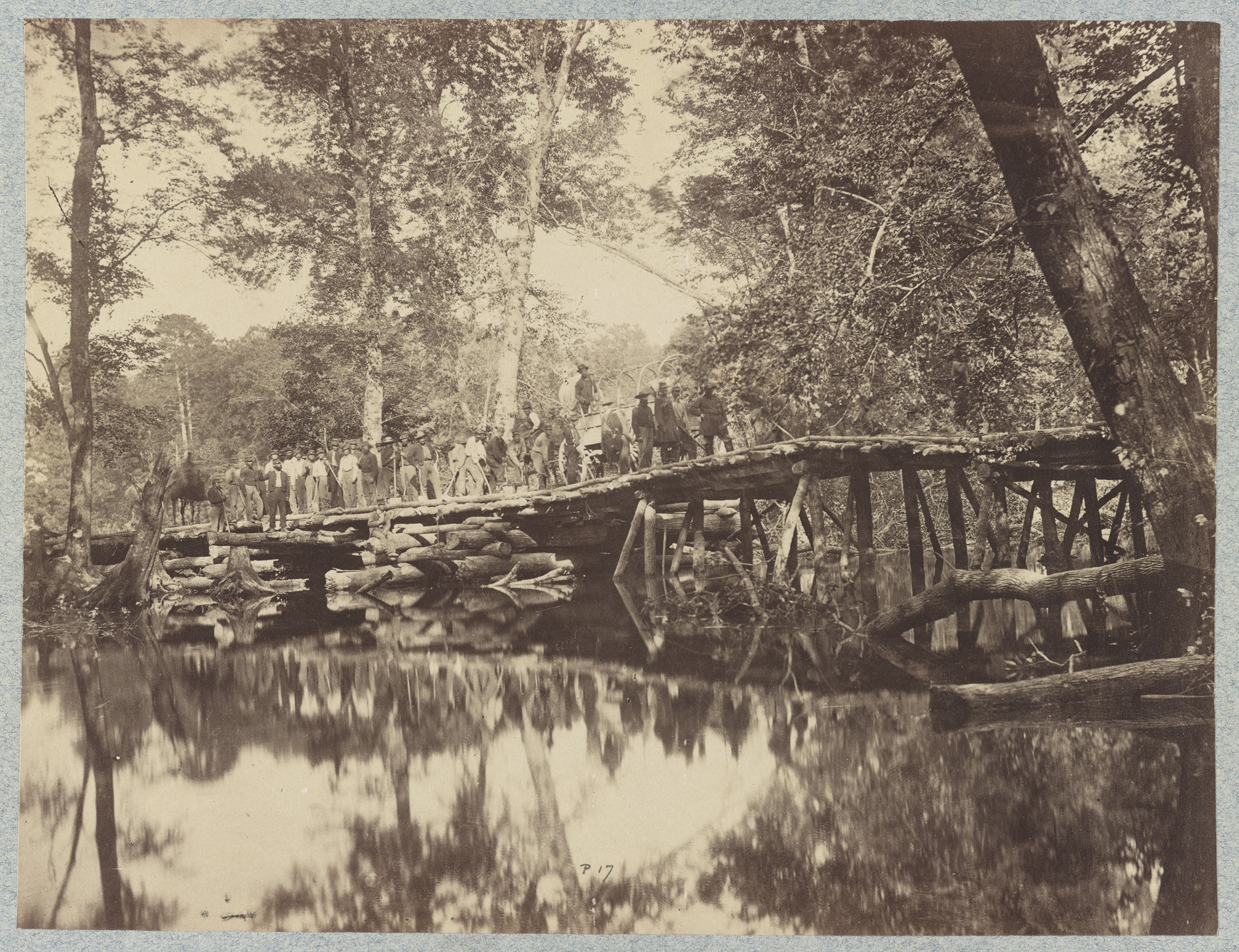 Union troops detailed to build Woodbury’s Bridge are reflected in the Chickahominy River. The sluggish waterway split McClellan’s force. (Library of Congress)