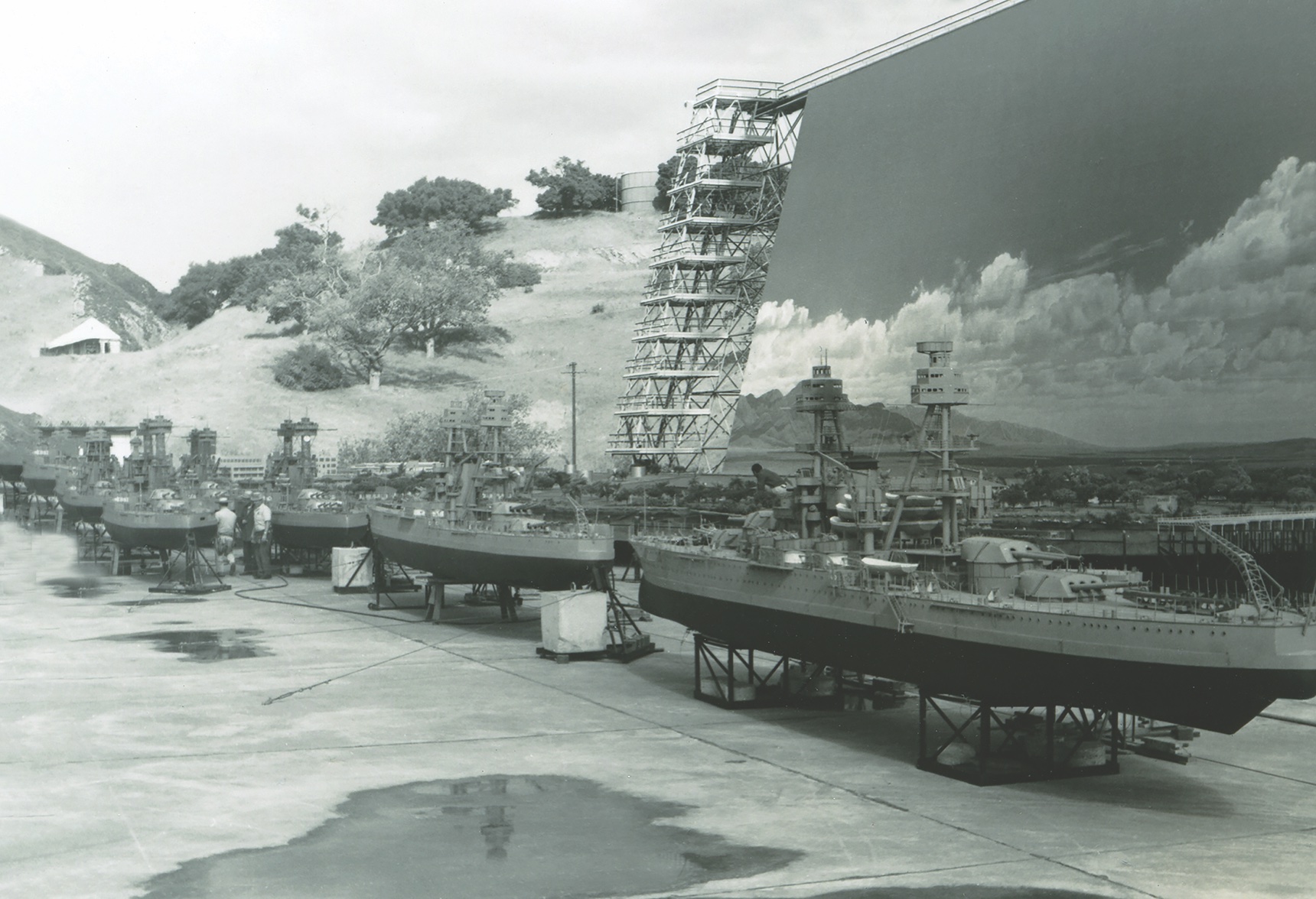 The miniatures department at Twentieth Century Fox built 29 scale-model ships for Tora! Tora! Tora! Some are shown here in front of the studio’s Sersen tank, with the mammoth “sky drop” in the background. (University of New Mexico)