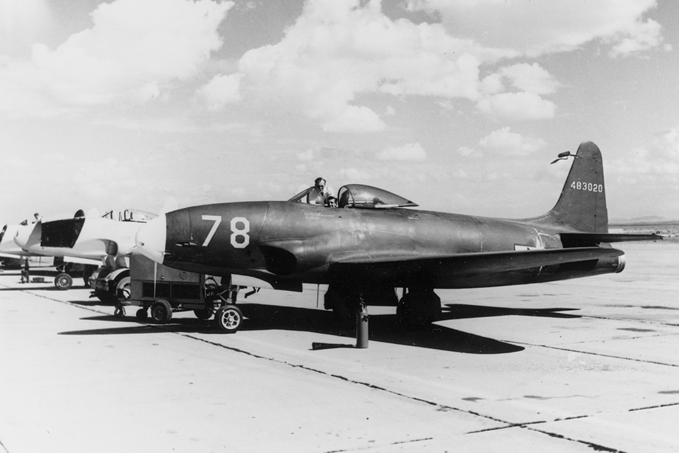 The original prototype, the XP-80 "Lulu Belle," fronts a lineup of Shooting Stars on the ramp at California's Muroc Army Airfield. (Lockheed Martin)