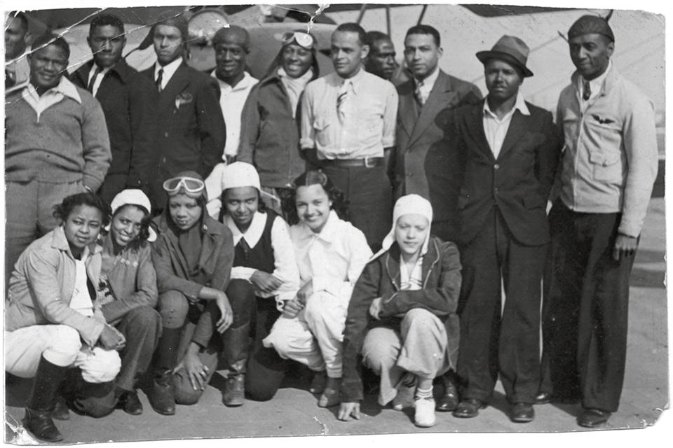 Successful businessman William J. Powell (far right), organized the Bessie Coleman Aero Club to promote aviation awareness in the black community. Both men and women were welcome to apply. Powell became a talented visionary and promoter of black involvement in aviation. (NASM 9A01548)
