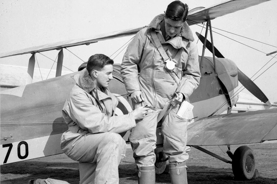 RAF Airmen wear insulated Sidcot flight suits that Cotton invented in 1917. (IWM CH2374)
