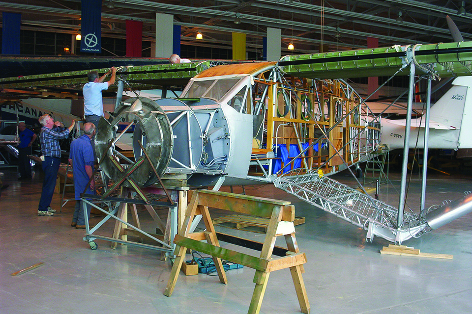 Museum volunteers work on the aircraft in 2006. (Royal Aviation Museum of Western Canada)