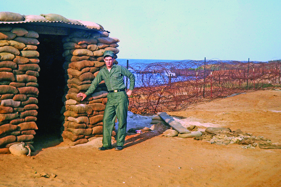 The author stands outside a bunker at VW-1's barracks in Chu Lai. (Courtesy of Michael A. Roy via Hank Caruso)