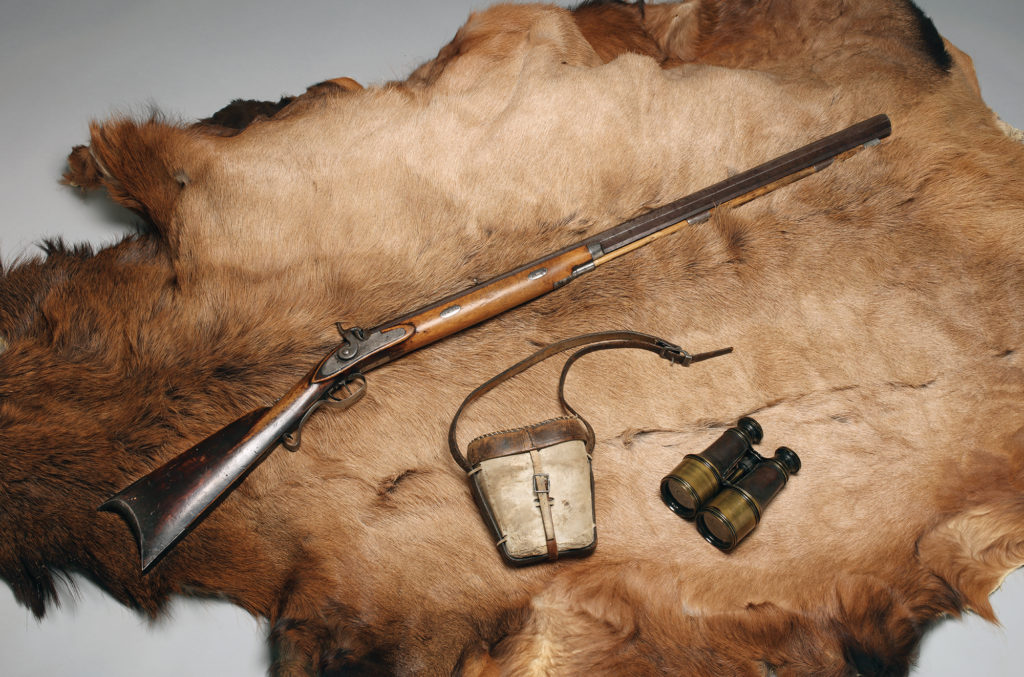 Jim Bridger rifle, powder horn and binoculars at Montana's Museum in Helena